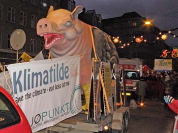 The pig says: Safe the Climate Eat Less of Me